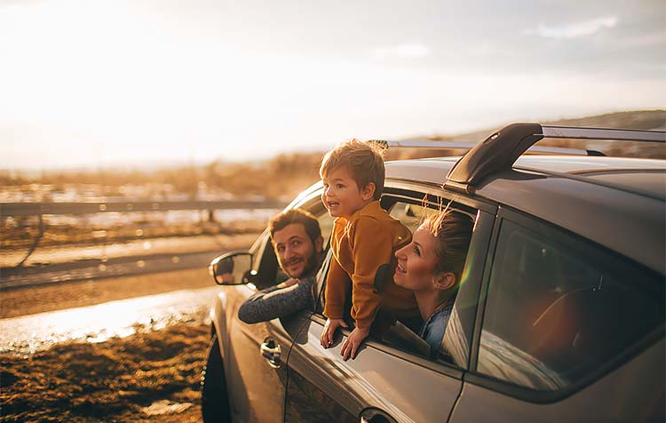 family in car