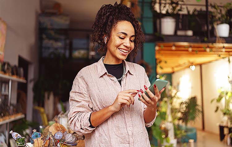 Woman in store on phone