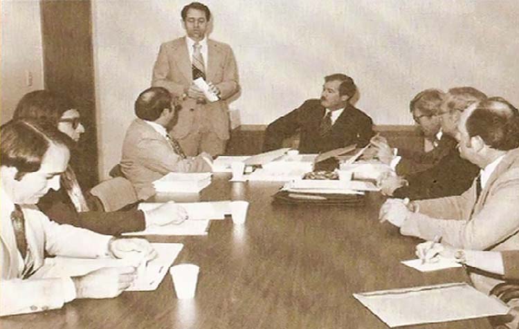 A historical picture of credit union leaders in a boardroom